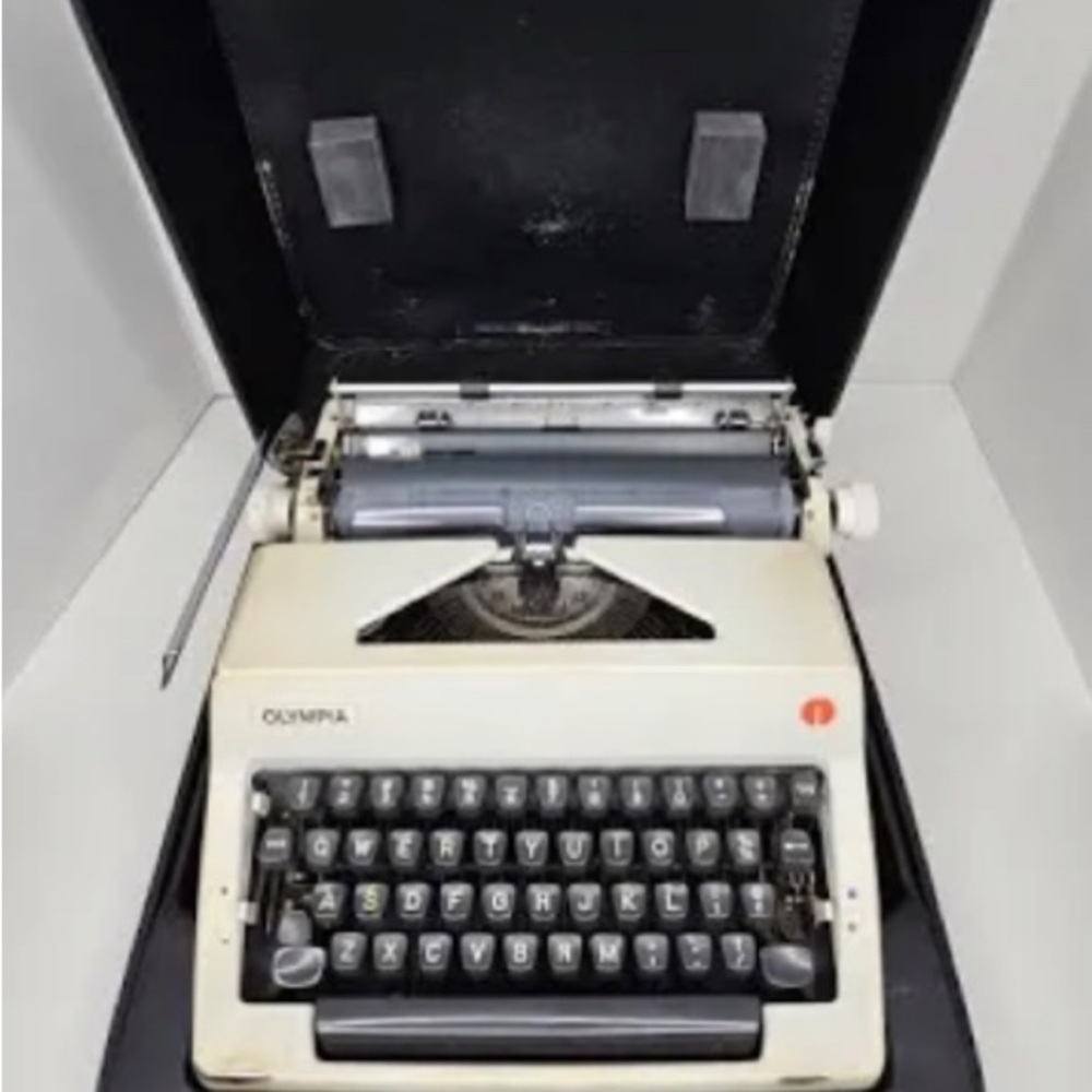 1970’s Olympia Vintage Typewriter - Black and White